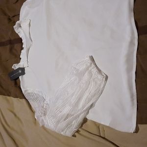 Silky blouse with sheer lace sleeves